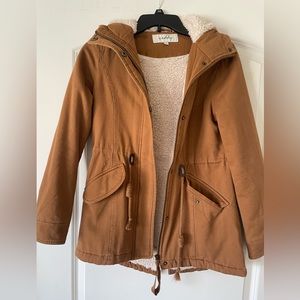 XS fur lined coat. Never worn !